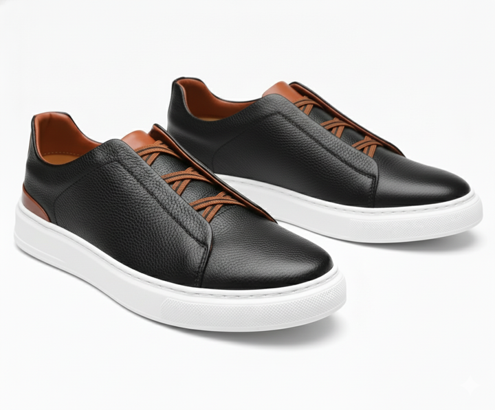 Close-up of the textured leather on men's Capri Comfort slip-on loafers, highlighting craftsmanship.