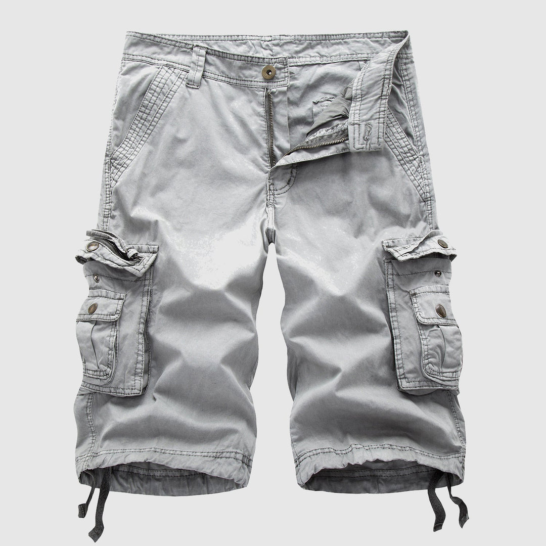 Men's multi-pocket cargo shorts featuring an adjustable hem, durable for outdoor gear & casual comfort.