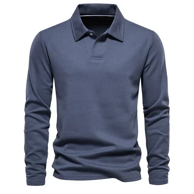 Men's long-sleeve polo shirt by Carlton. Features a turn-down collar and regular fit for everyday style.