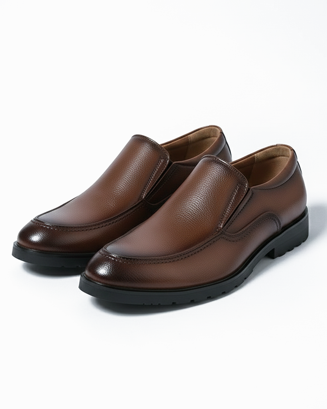 Men's casual comfort slip-on loafers in a classic brown leather finish, perfect for everyday wear.