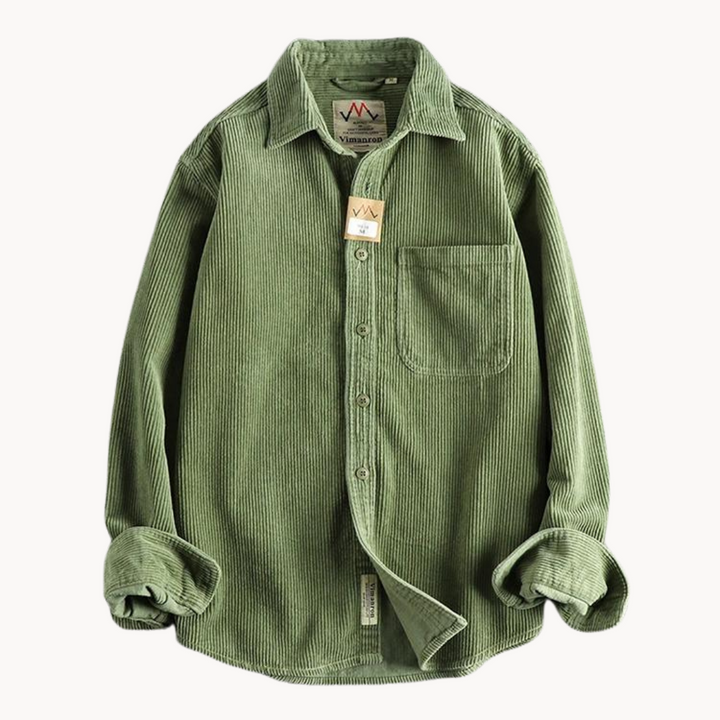 Man adjusting the collar of his comfortable corduroy long sleeve button-down shirt in a casual setting.