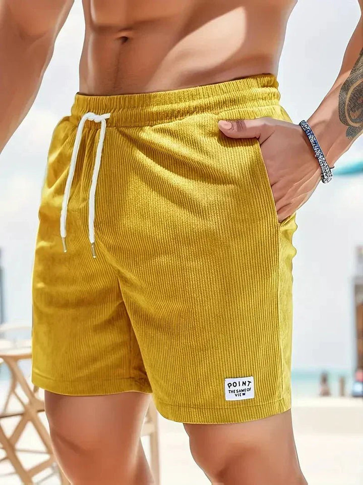Men's casual shorts: textured corduroy with drawstring, great for relaxed everyday wear.