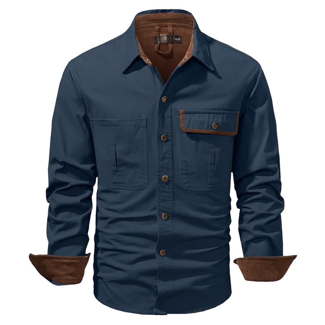 Men's fashion: olive green cotton button-up shirt jacket styled open over a t-shirt.