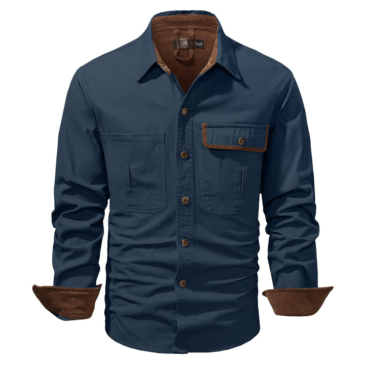 Men's fashion: olive green cotton button-up shirt jacket styled open over a t-shirt.