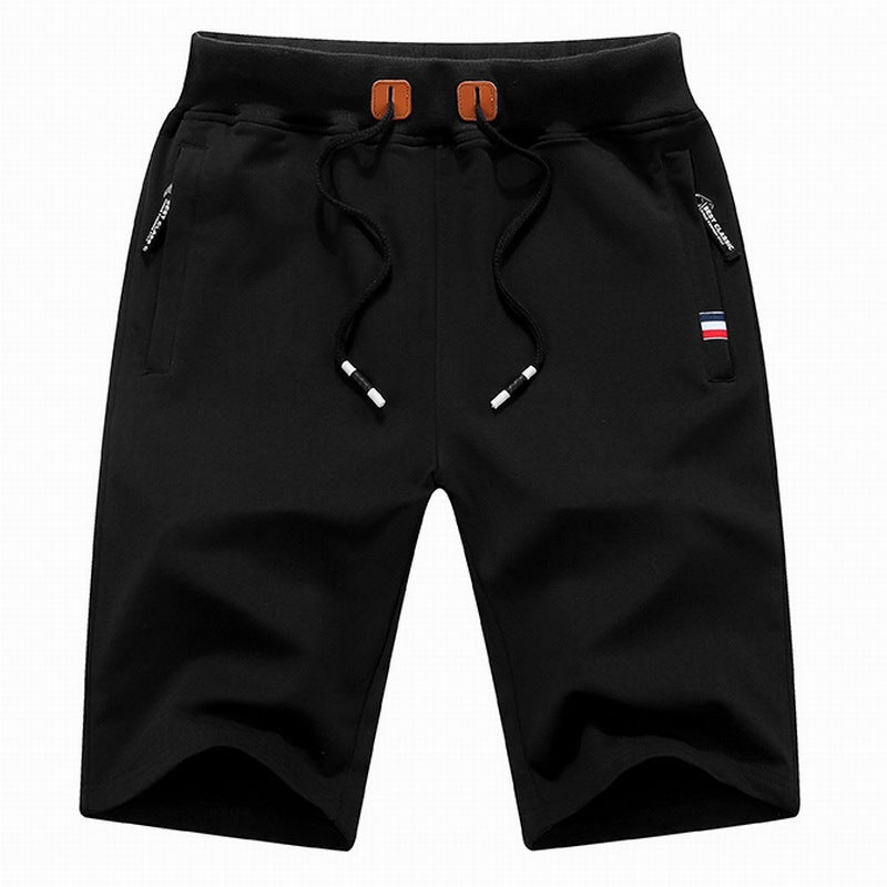 Stylish men's casual shorts featuring an adjustable drawstring waist & practical zippered pockets for essentials.