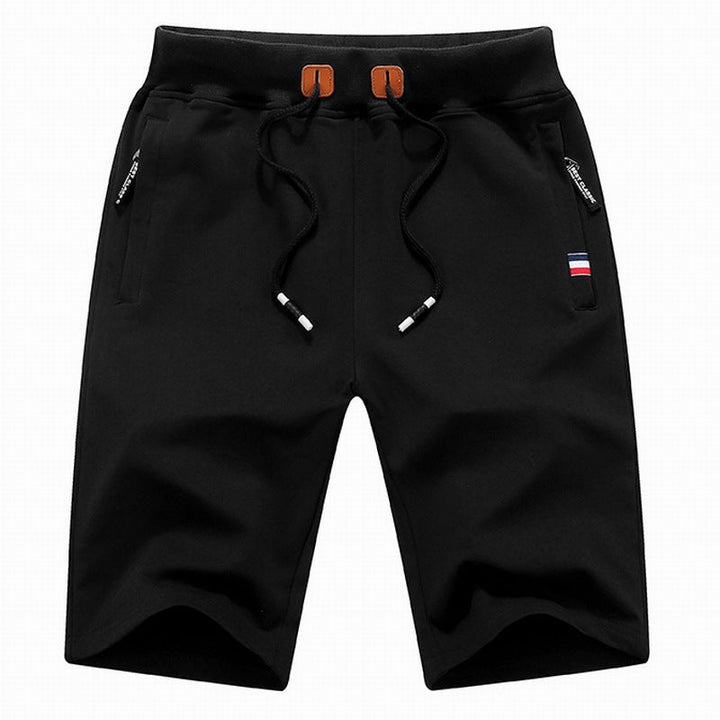 Stylish men's casual shorts featuring an adjustable drawstring waist & practical zippered pockets for essentials.