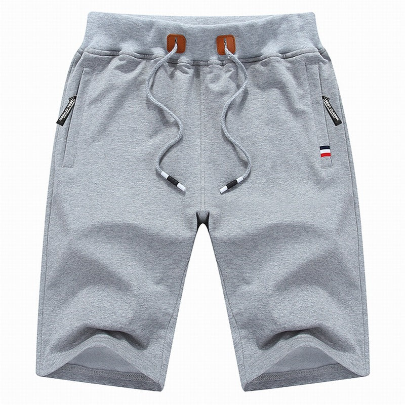 Versatile men's casual drawstring shorts with secure zipper pockets for everyday comfort, gym & summer.