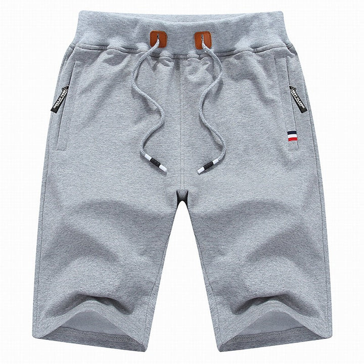 Versatile men's casual drawstring shorts with secure zipper pockets for everyday comfort, gym & summer.
