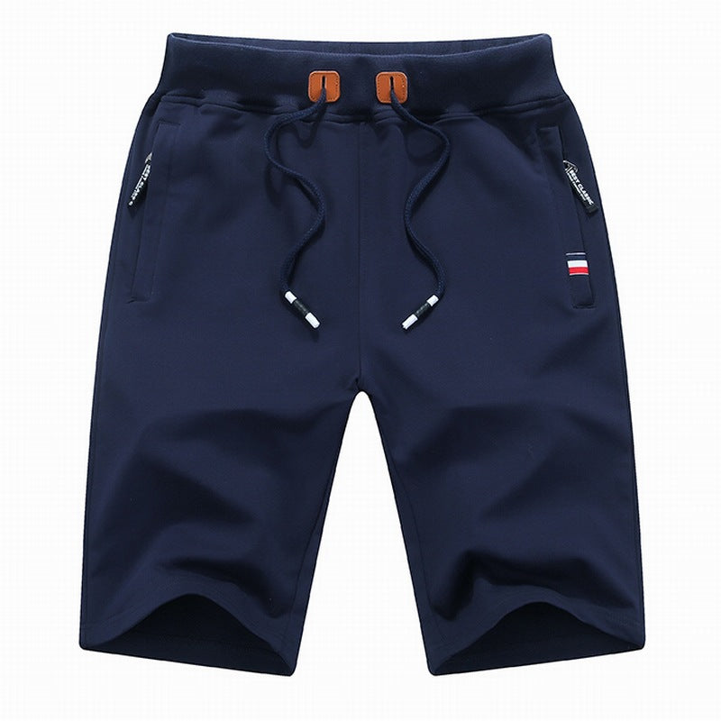 Durable men's casual shorts, relaxed fit, adjustable drawstring, and secure zipper pockets for ultimate comfort & utility.