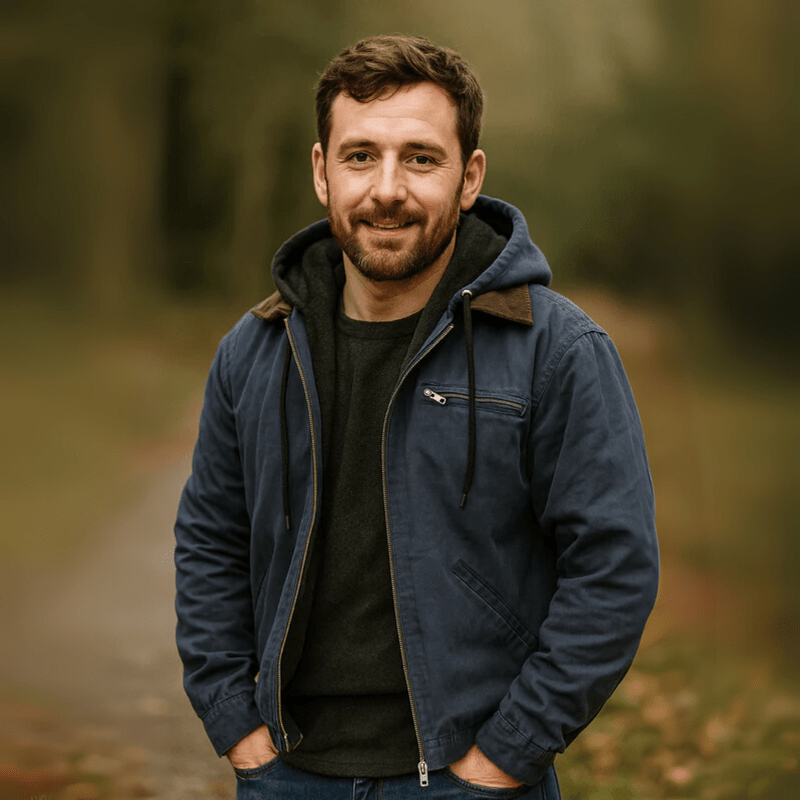 Close-up of the soft fleece fabric and zipper detail on a men's casual hooded jacket