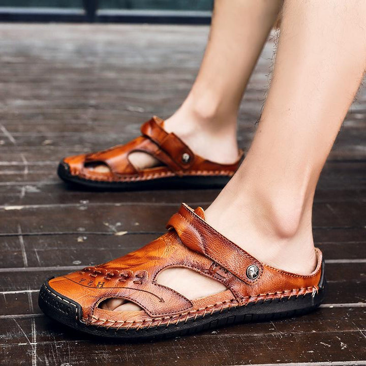 Front view of men's open toe leather sandals, emphasizing breathable straps and comfort