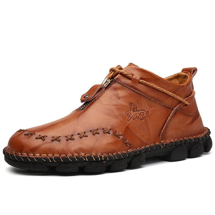 Men's casual hand-stitched leather ankle boots for winter. Comfortable and durable men's footwear.