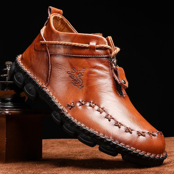 Full view of men's casual leather ankle boots, perfect for fall and winter fashion. Comfortable footwear.