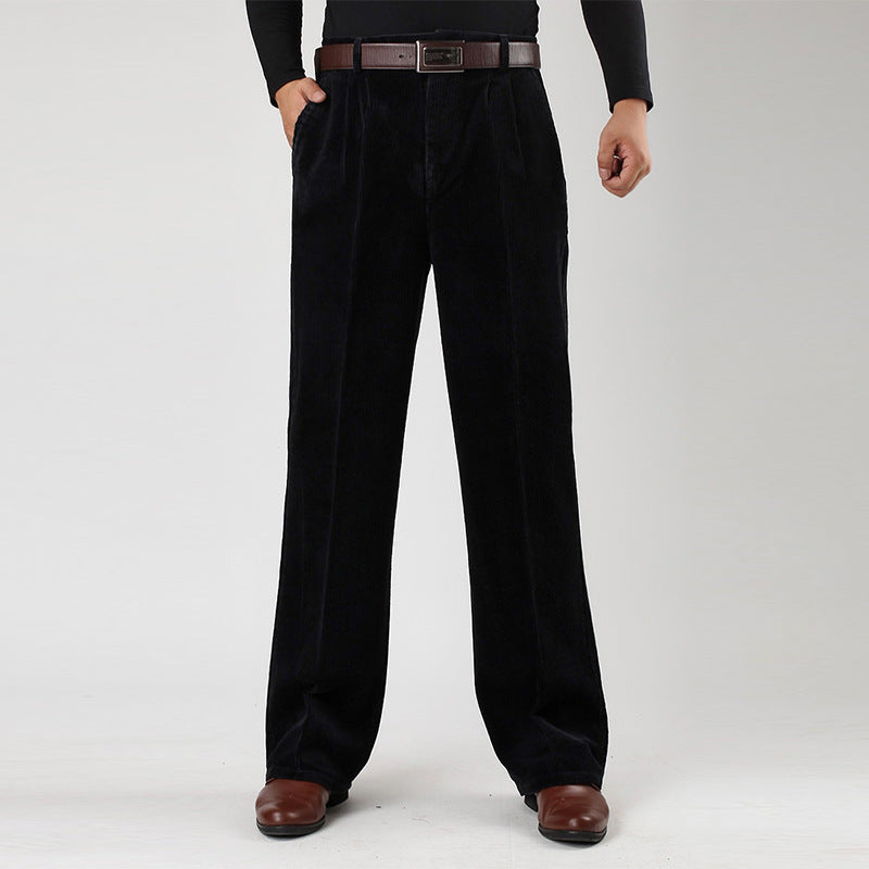 Close-up of the pleats and high-waist design on men's casual trousers