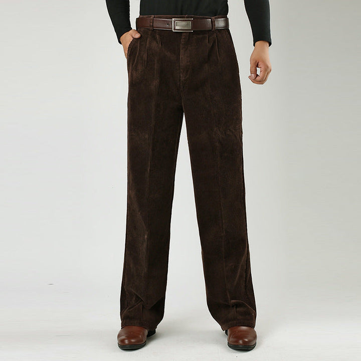 Studio shot of classic men's pleated pants, emphasizing the high-waist and casual style