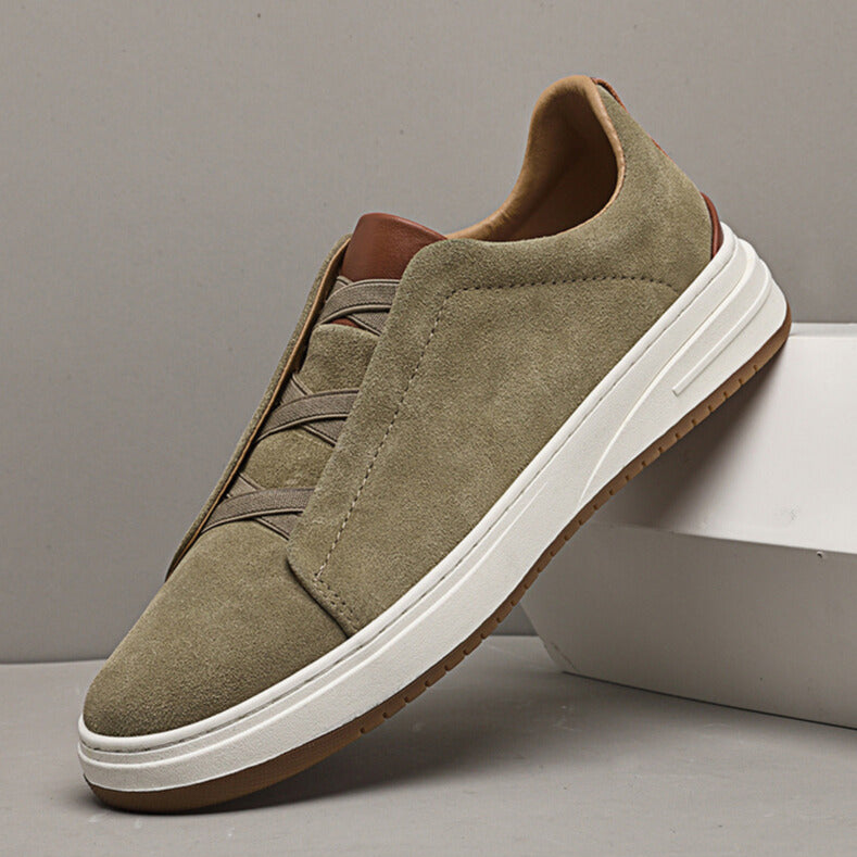 Men's casual khaki suede slip-on sneakers with white sole, perfect for everyday comfort and style.