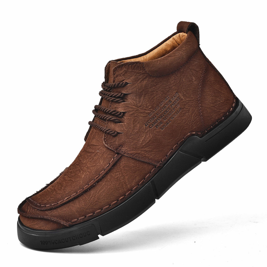 Soft sole men's leather high-top boots, casual design for comfortable and supported winter wear.
