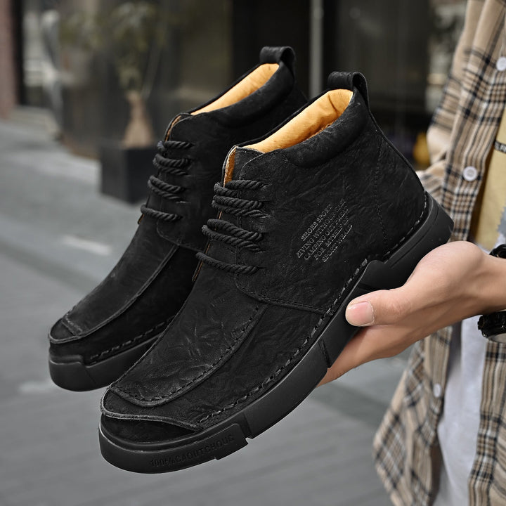 Men's fashion high-top leather boots, soft sole adds orthopedic comfort for winter style.