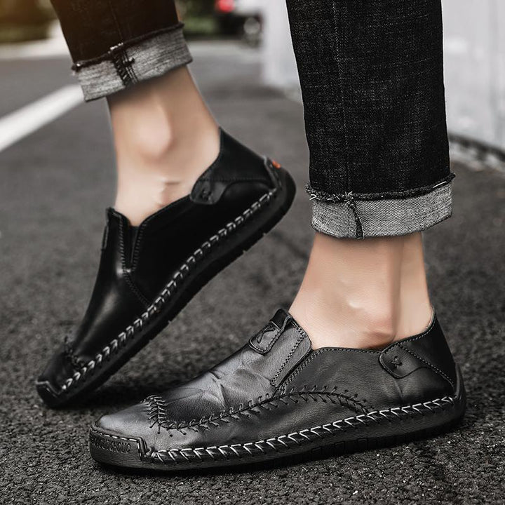 Genuine leather men's casual shoes, with hand-stitched details and a flexible, soft non-slip sole
