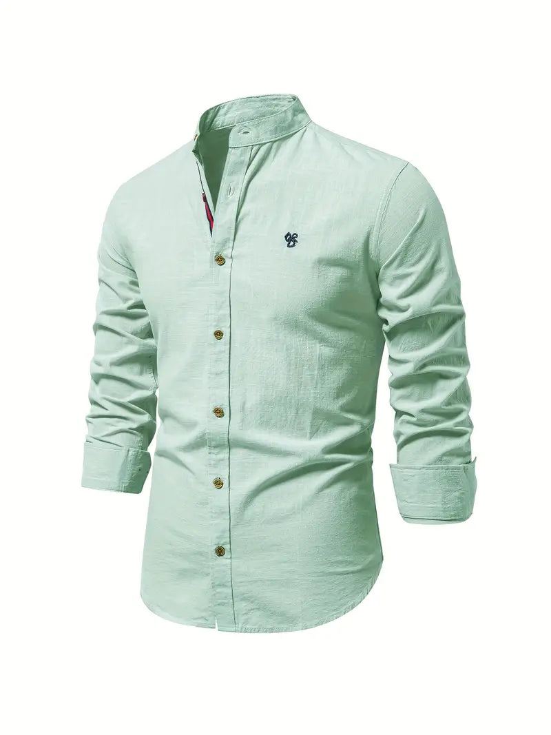 Close-up of a men's casual button-down shirt, showing fabric texture and buttons, relaxed fit.