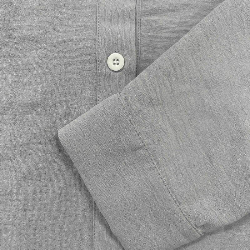 Versatile men's casual long sleeve shirt, button-up design with a comfortable regular fit for any occasion.