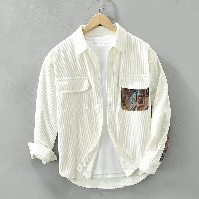 Breathable men's cotton shirt featuring a stylish patterned pocket, versatile for various casual occasions.