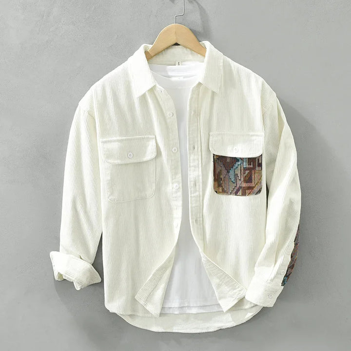 Breathable men's cotton shirt featuring a stylish patterned pocket, versatile for various casual occasions.