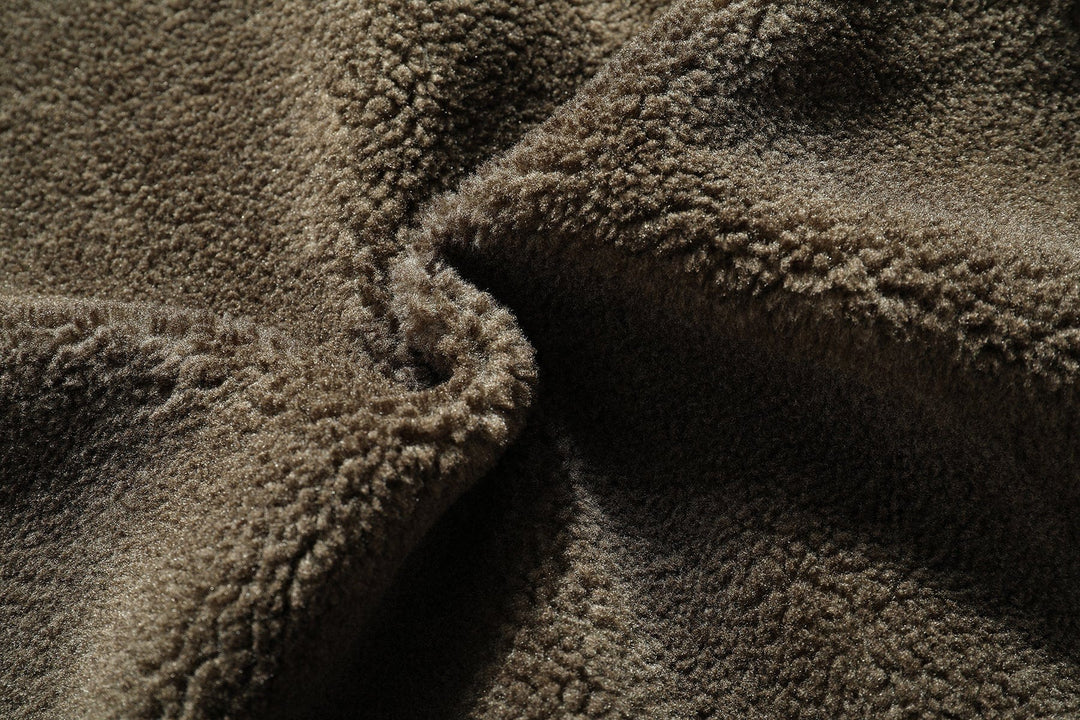 Detail shot of the collar on a men's durable outdoor casual jacket, suitable for spring menswear.