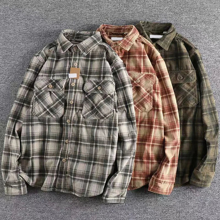Men's rugged plaid flannel shirt, great for layering or as a stand-alone piece in winter fashion.