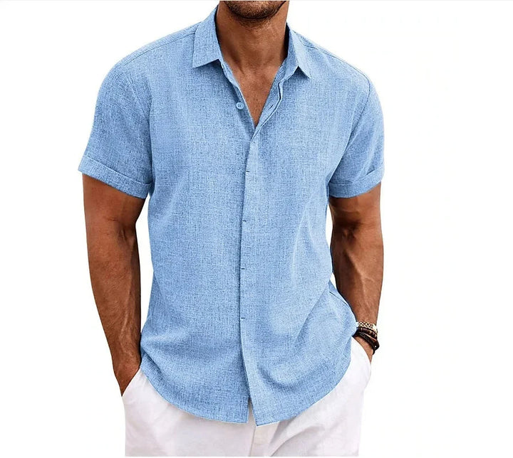 Man wearing a comfortable short sleeve button-down shirt, ideal for casual summer style.