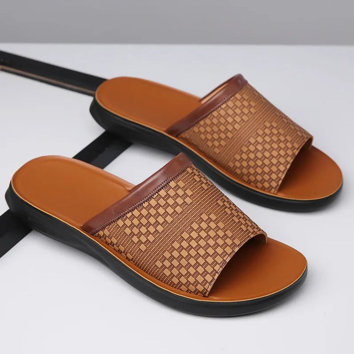 Top-down view of men's comfort slip-on sandals, ready for summer adventures