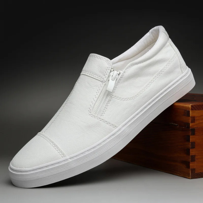 Stylish men's sneakers, black, with a secure zip closure and durable leather-like material