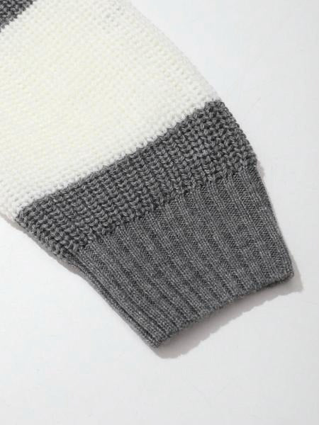 Detail of the collar and striped pattern on a men's knit rugby polo top, showcasing quality craftsmanship.