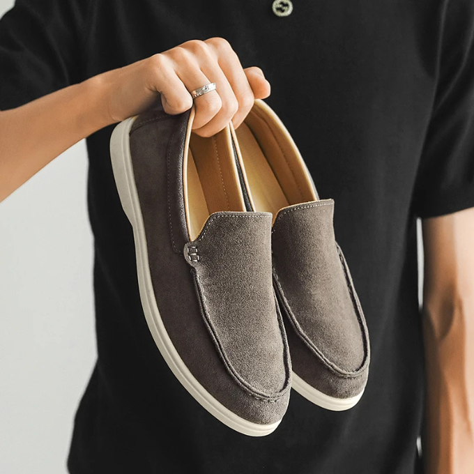 Front view of men's casual suede-look loafers, showcasing their elegant minimalist design.