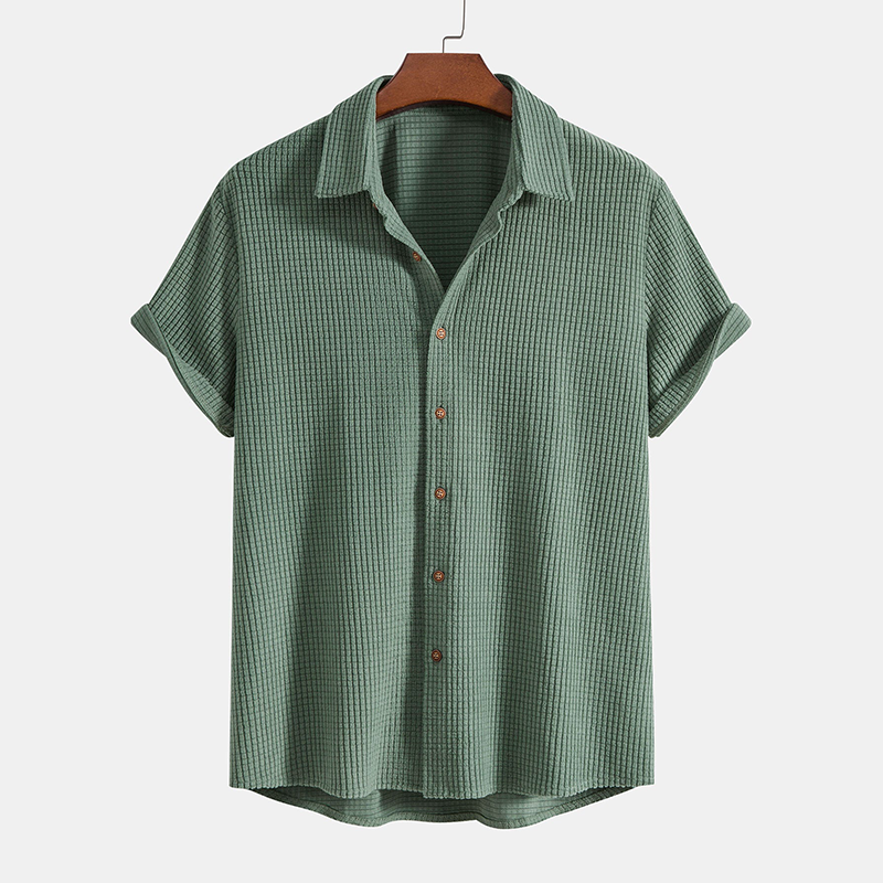 Stylish men's casual summer outfit: textured short sleeve shirt & matching drawstring shorts.