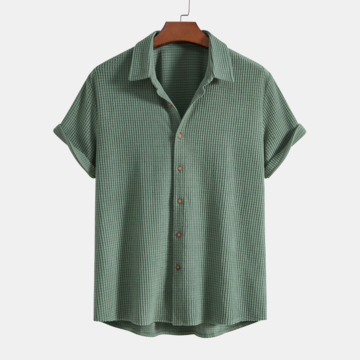 Stylish men's casual summer outfit: textured short sleeve shirt & matching drawstring shorts.