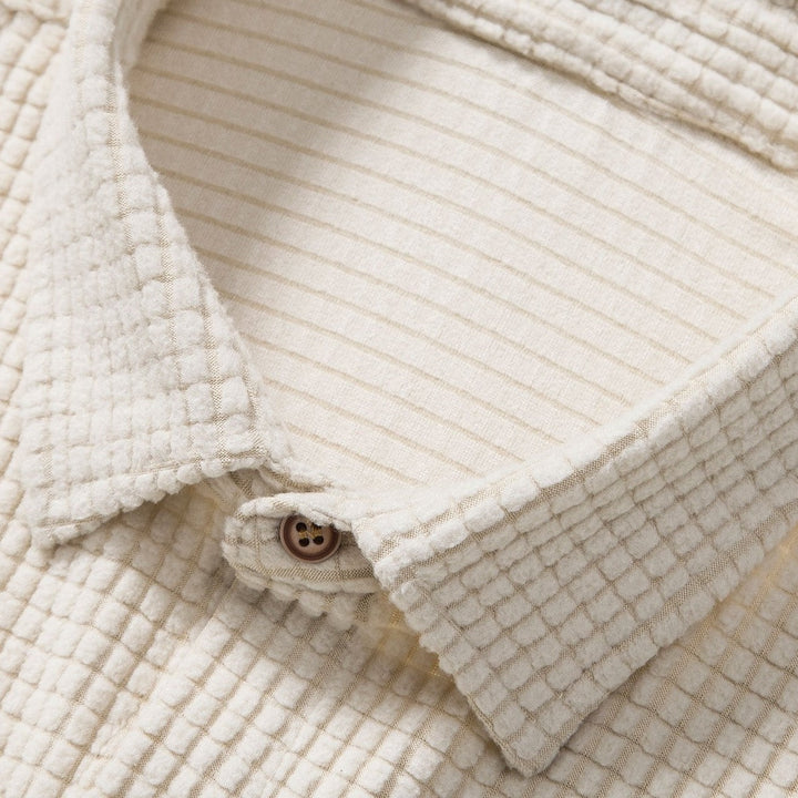 Men's textured casual summer 2 piece set with a short sleeve button-down shirt & drawstring shorts.