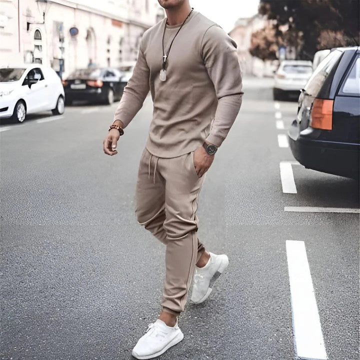Close-up of a men's casual two-piece tracksuit fabric, highlighting the quality and comfort, suitable for loungewear.