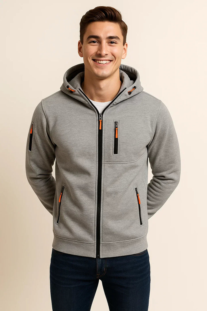 Side view of a man in a relaxed fit zip-front hoodie, demonstrating casual style & versatility.