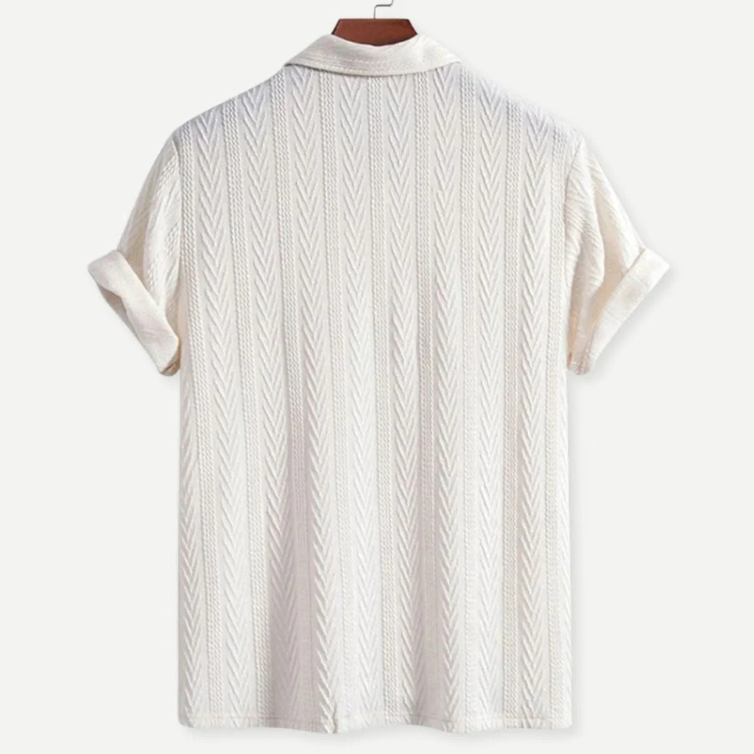 Men's chevron textured cotton polo shirt in a neutral color, ideal for smart casual or everyday wear.