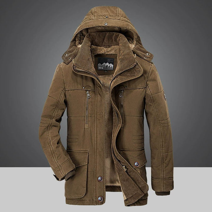 Lifestyle image of a man in a corduroy sherpa parka, suitable for winter fashion and warmth