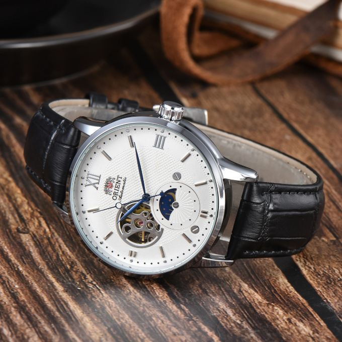 Men's classic automatic watch on a wrist, showcasing its timeless appeal and comfort