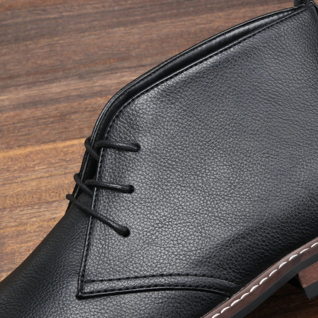 Durable men's chukka boots in black, offering comfort and classic style to any outfit.