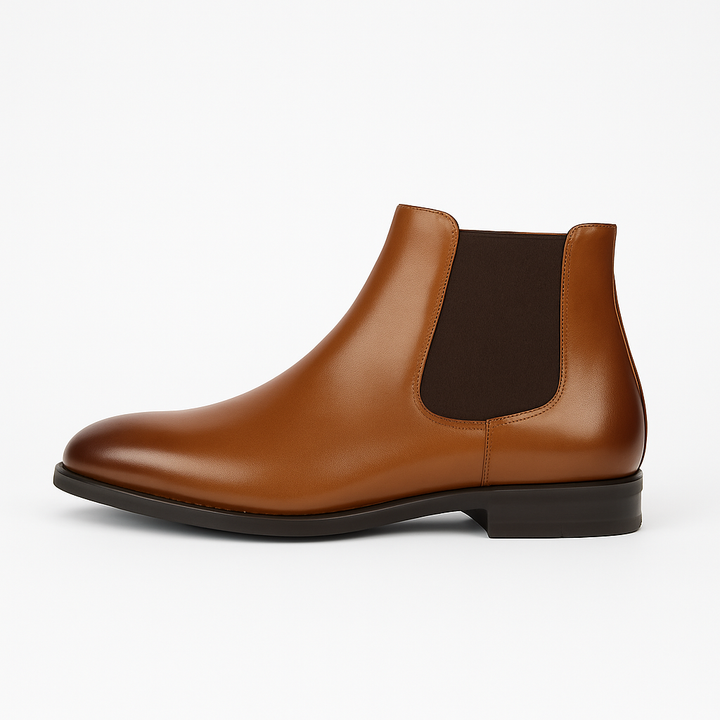 Comfortable brown leather men's Chelsea boots. Versatile slip-on ankle footwear for everyday wear and sophistication.