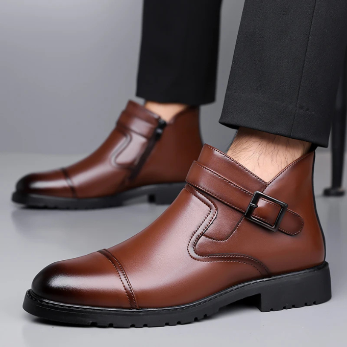 Stylish men's Chelsea boots in rich brown leather, perfect for dressy outfits and everyday fashion.