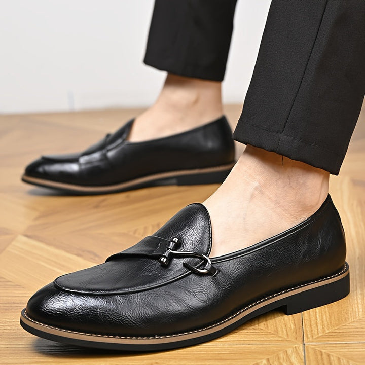 Men's formal black leather loafers, ideal for business or special occasions, comfortable slip-on design