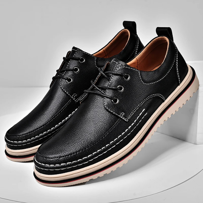 Dark brown leather men's moc-toe Derby shoes, top-down view, comfortable and stylish.