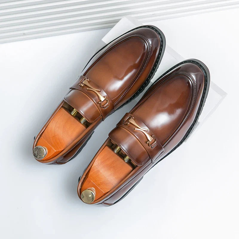 Men's classic black slip-on loafers, ideal for formal and casual wear, featuring a polished finish.