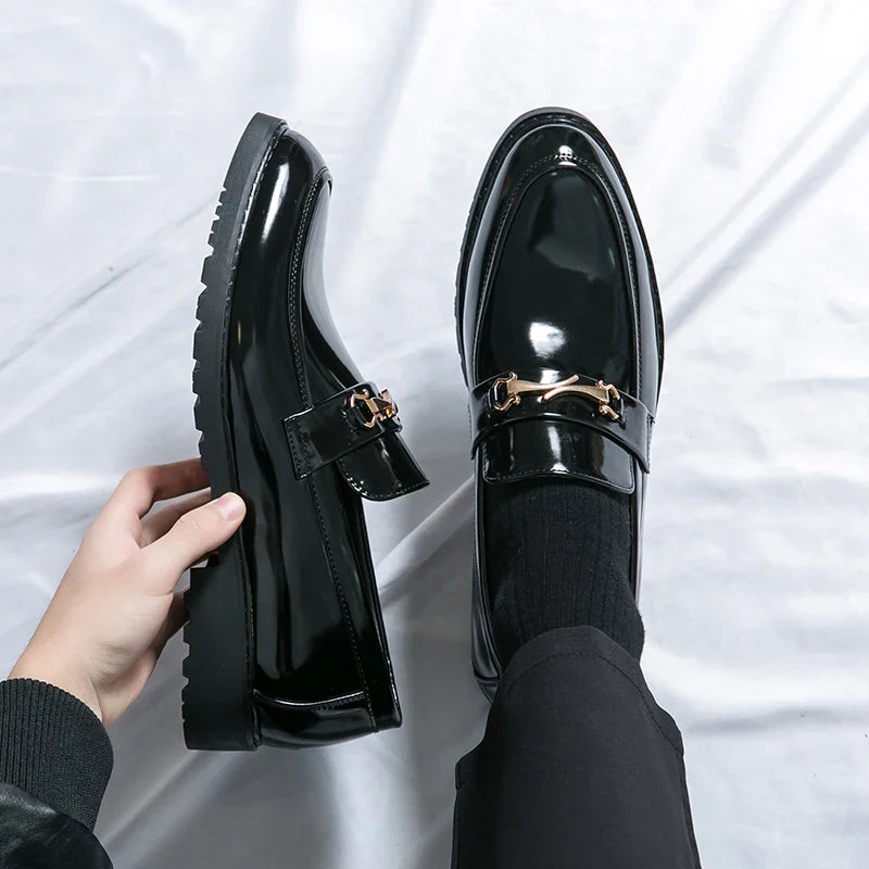 Close-up of a men's classic slip-on loafer in rich brown, showcasing the elegant leather texture.