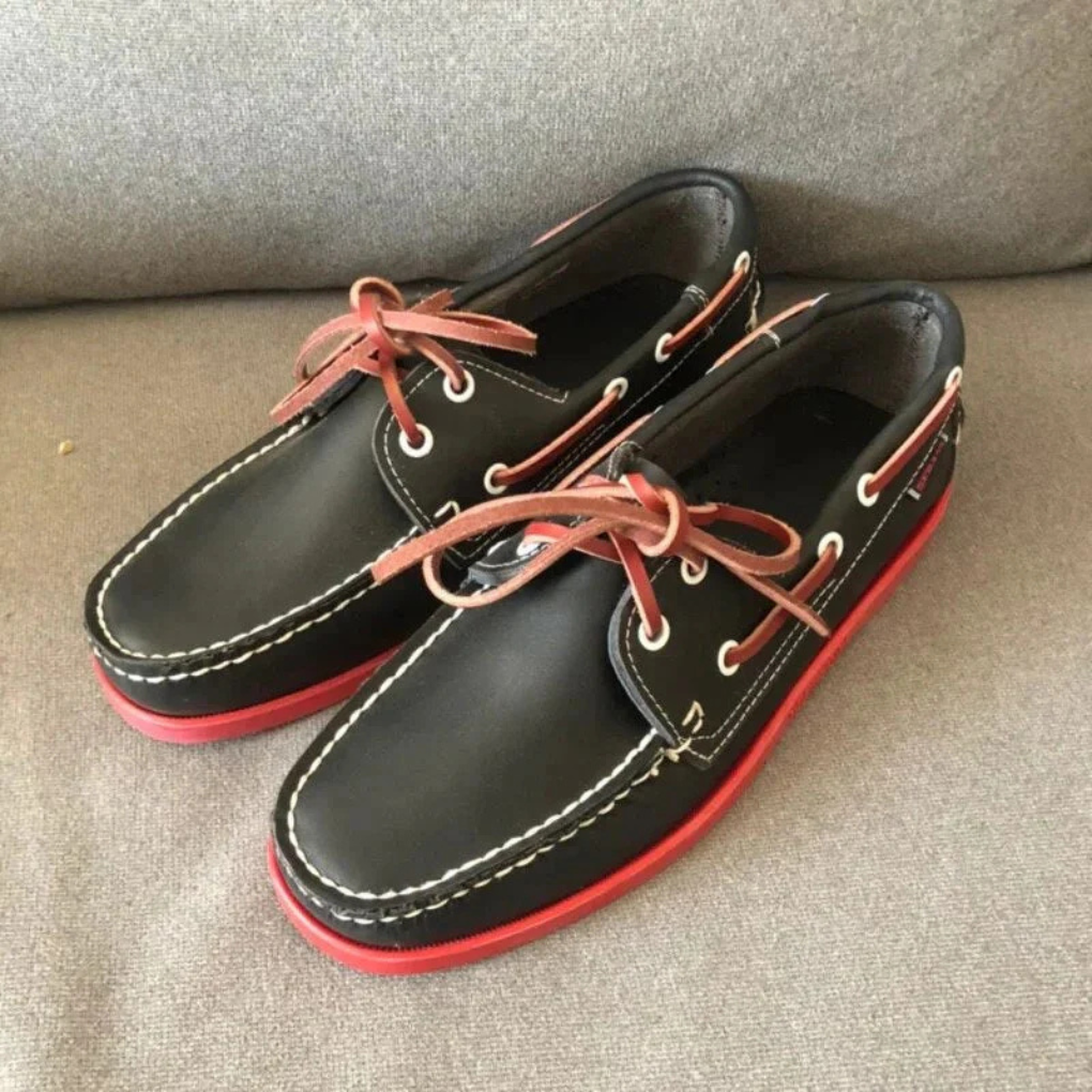 Stylish men's boat shoes, comfortable moccasin-style design. Versatile casual footwear perfect for summer and nautical looks.